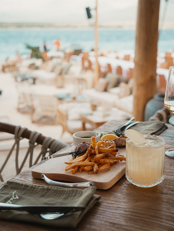 Lunch by the ocean at Bahia Gili Air with fries and cocktails